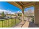 Spacious balcony offering stunning views of the surrounding neighborhood and beautiful greenery at 2215 Calais Dr # G, Longmont, CO 80504