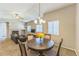 Cozy dining area is adjacent to the living room, with natural light and plenty of space at 2215 Calais Dr # G, Longmont, CO 80504