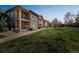 Condo exteriors with well-manicured lawns and walkways, providing a serene living environment at 2215 Calais Dr # G, Longmont, CO 80504