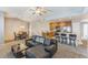 Inviting living space seamlessly connected to the kitchen, with a modern sofa and dining area at 2215 Calais Dr # G, Longmont, CO 80504