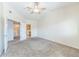 Neutral main bedroom showcasing connecting bathroom, and an open concept layout at 2215 Calais Dr # G, Longmont, CO 80504