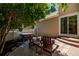 Backyard patio with hot tub and Adirondack chairs at 11300 Night Heron Dr, Parker, CO 80134