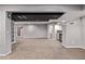 Basement with carpet, partial wet bar, and access to bathroom at 11300 Night Heron Dr, Parker, CO 80134