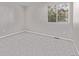 Neutral bedroom with soft carpet, a window, and an installed mount for a tv at 11300 Night Heron Dr, Parker, CO 80134