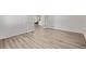 Spacious bedroom with hardwood floors, french doors, and ample natural light at 11300 Night Heron Dr, Parker, CO 80134