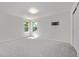 Carpeted bedroom featuring two windows and a blank wall, perfect for customization at 11300 Night Heron Dr, Parker, CO 80134