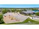 Aerial view of a playground with swings, slides, and a basketball court in a residential area at 11300 Night Heron Dr, Parker, CO 80134