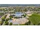 Aerial view of the neighborhood school featuring playground, sports fields, and ample parking at 11300 Night Heron Dr, Parker, CO 80134