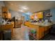 Spacious kitchen featuring granite countertops, stainless steel appliances, and lots of storage space at 15682 Morris Ave, Fort Lupton, CO 80621