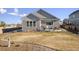 A spacious backyard featuring a well-maintained lawn and patio perfect for outdoor enjoyment at 771 Dutton Ct, Castle Rock, CO 80104