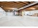 Spacious unfinished basement with high ceilings, ready for customization and extra storage at 771 Dutton Ct, Castle Rock, CO 80104