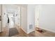 Bright hallway featuring hardwood floors that lead to various rooms at 771 Dutton Ct, Castle Rock, CO 80104