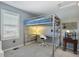 Bedroom featuring lofted bed and dedicated desk area, perfect for work or study at 22336 E Bellewood Dr, Aurora, CO 80015