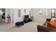 Casual living room with neutral walls, a TV, and lots of light at 22336 E Bellewood Dr, Aurora, CO 80015