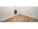 Bright bedroom with a view into the stylishly remodeled bathroom at 9405 W 54Th Pl, Arvada, CO 80002
