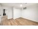 Bright living room features a closet and wood burning stove in the background at 9405 W 54Th Pl, Arvada, CO 80002
