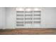 Built-in shelving with recessed lighting on modern wood flooring at 9405 W 54Th Pl, Arvada, CO 80002