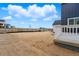 Spacious backyard with wood fence and a beautiful view of the neighborhood at 17747 Prairie Peak Trl, Parker, CO 80134