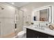 Modern basement bathroom with a large walk-in shower at 6551 S Harlan Ct, Littleton, CO 80123