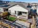 Aerial view showcasing the home's backyard, landscaping, and patio at 17412 W 93Rd Pl, Arvada, CO 80007