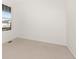 Empty bedroom showcasing ample natural light and neutral carpeting at 17412 W 93Rd Pl, Arvada, CO 80007