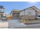 Charming single-Gathering home with a covered porch, a two-car garage, and professionally landscaped front yard at 17412 W 93Rd Pl, Arvada, CO 80007