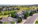 Aerial view of a residential area with well-maintained houses and lush greenery at 2980 Craig Ct, Castle Rock, CO 80109