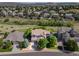 Wide aerial view showcasing the roofline of the home with mature landscaping and neighborhood at 2980 Craig Ct, Castle Rock, CO 80109