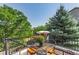 Private balcony with comfortable seating overlooking lush greenery at 2980 Craig Ct, Castle Rock, CO 80109