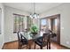 Elegant dining room with wood table set and natural lighting at 2980 Craig Ct, Castle Rock, CO 80109
