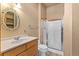 Bathroom featuring a vanity with marble countertops and a walk-in shower at 2785 Magpie Ln, Larkspur, CO 80118