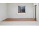 Bedroom with wood floors, closet, and a window at 7276 Brighton Ct, Castle Pines, CO 80108