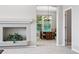 View from the living room to the dining room showcases a chandelier and natural light at 7276 Brighton Ct, Castle Pines, CO 80108