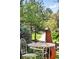 Close up of a patio set with chairs and an earth oven at 7276 Brighton Ct, Castle Pines, CO 80108