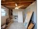Unfinished basement with exposed wood beams and concrete floor at 17863 Fringed Sage Way, Parker, CO 80134
