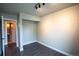 Bedroom featuring hardwood floors, neutral paint, and closet at 17863 Fringed Sage Way, Parker, CO 80134