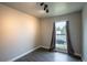 Bedroom with window, neutral paint, and hard wood floors at 17863 Fringed Sage Way, Parker, CO 80134
