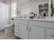 Bathroom with double vanity, large mirrors, and modern fixtures at 23998 E Atlantic Pl, Aurora, CO 80018