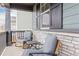 Inviting front porch with comfortable seating area at 23998 E Atlantic Pl, Aurora, CO 80018