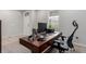 Bright home office with modern desk and chair at 23998 E Atlantic Pl, Aurora, CO 80018