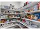 Walk-in pantry featuring abundant shelving for organized food and supply storage at 23998 E Atlantic Pl, Aurora, CO 80018