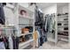 Walk-in closet with clothing racks, shelving and space for organized storage at 23998 E Atlantic Pl, Aurora, CO 80018