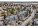 Community aerial view featuring lush trees, well-maintained landscaping, and ample parking at 6776 S Ivy St # B5, Centennial, CO 80112