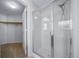 Bathroom featuring a shower with glass doors and a silver showerhead at 18150 Bolero Dr, Parker, CO 80134