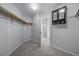 Walk-in closet with shelving and rod for organization, leading to the bathroom at 18150 Bolero Dr, Parker, CO 80134