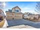 Spacious two-story home with a large driveway and well-maintained front yard at 18150 Bolero Dr, Parker, CO 80134