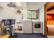 Laundry area featuring a washing machine and dryer at 6458 W Clifton Pl, Littleton, CO 80128