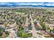 A picturesque neighborhood featuring tree-lined streets and well-maintained homes at 6458 W Clifton Pl, Littleton, CO 80128
