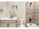 Modern bathroom showcasing sleek black fixtures, neutral tiling and a tub-shower combination at 423 Basin Daisy St, Castle Rock, CO 80104