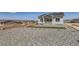 New construction with rock landscaping featuring a charming light grey two story house at 423 Basin Daisy St, Castle Rock, CO 80104
